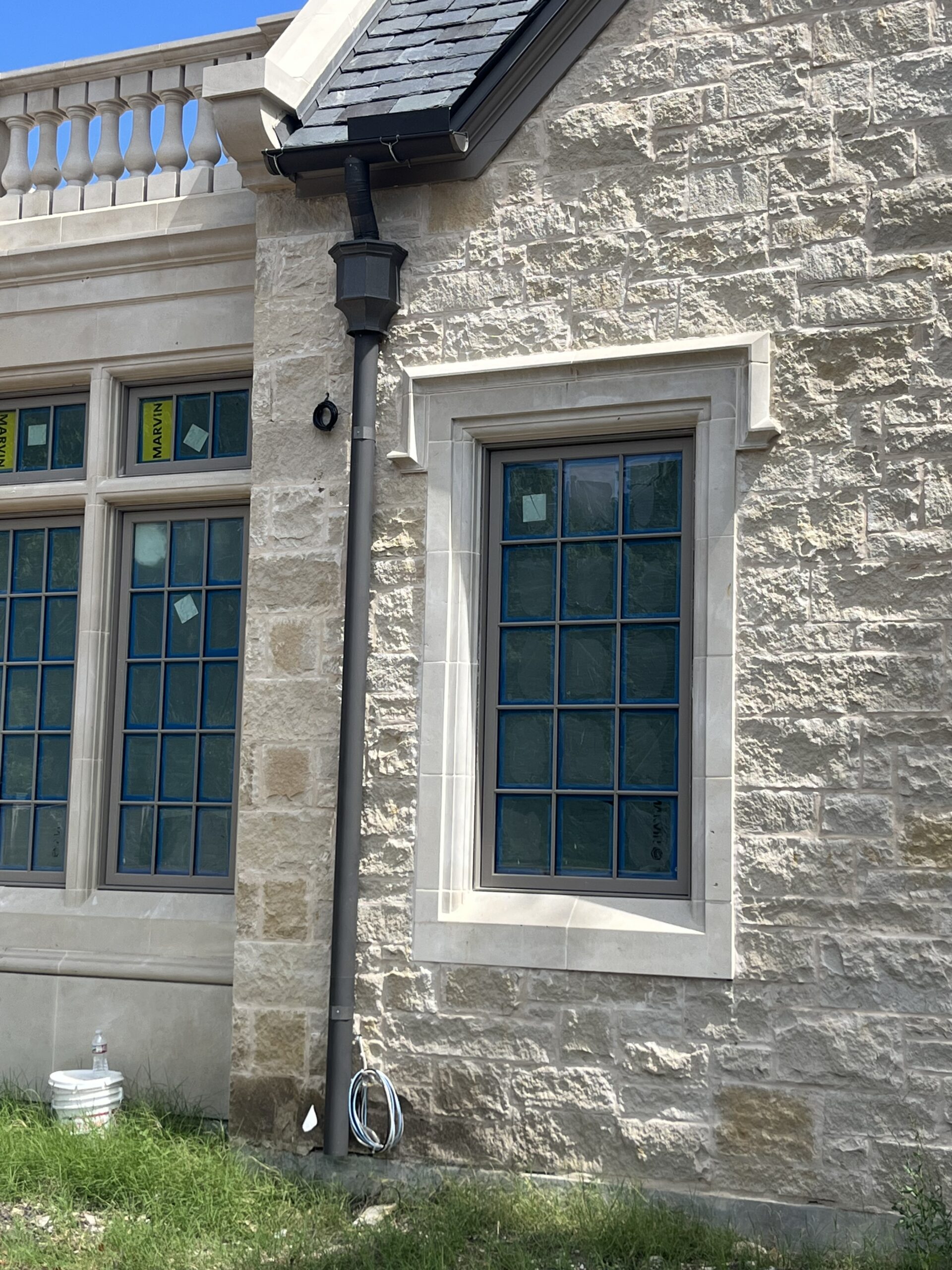 Gutter Installation on stone house